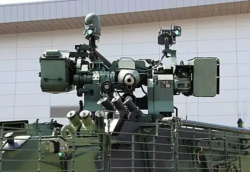 30mm Mk44 Bushmaster II and M240 machine gun and Spike LR mounted on Czech Pandur II IFV