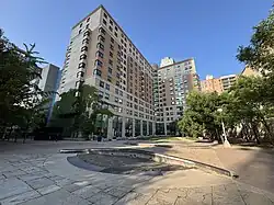 multi-story two-tone brown and light brown building