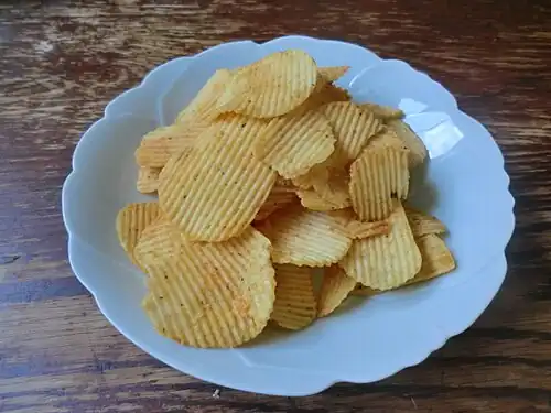 Bowl of pizza-flavored chips in Japan