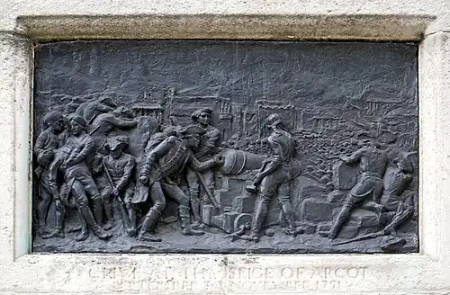 Plinth of the statue of Robert Clive, London, created by John Tweed, depicting the Siege of Arcot