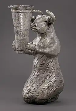 Proto-Elamite kneeling bull holding a spouted vessel; 3100–2900 BC; 16.3×6.3×10.8&nbsp;cm; Metropolitan Museum of Art (New York City)