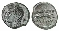 Coin of Pyrrhus minted at Syracuse, 278 BC. Obverse: Veiled head of Phtia with oak wreath, caption ΦΘΙΑΣ (of Phtia). Reverse: Thunderbolt, ΒΑΣΙΛΕΩΣ ΠΥΡΡΟΥ (of King Pyrrhus).