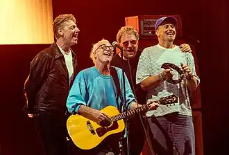 Travis performing at Victorious Festival 2025 L to R: Dougie Payne, Fran Healy, Andy Dunlop, Neil Primrose