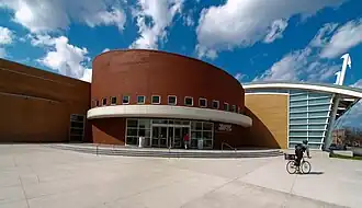 The Gerald Ratner Athletics Center, opened in 2003 and designed by Cesar Pelli, houses the volleyball, wrestling, swimming, and basketball teams.[57]