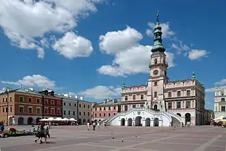 Zamość City Hall, designed by Bernardo Morando, is a unique example of Renaissance architecture in Europe, consistently built in accordance with the Italian theories of an "ideal town".[283]