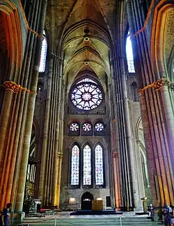 Interior of the south transept, with rose window
