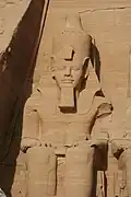 Close-up of the leftmost statue at the temple of Ramesses II