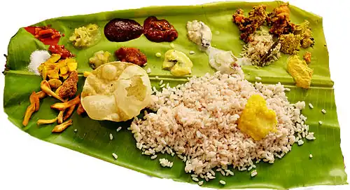 A typical sadhya, where banana leaves are used as plates