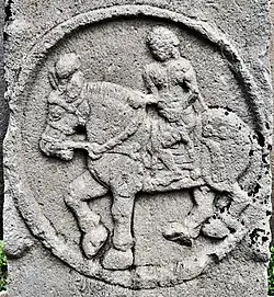 Foreigner on a horse. The medallions are dated circa 115 BC.[186]