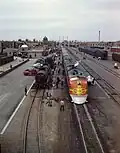 The L.A.-bound Super Chief gets its 5-minute pit-stop service in Albuquerque in 1943