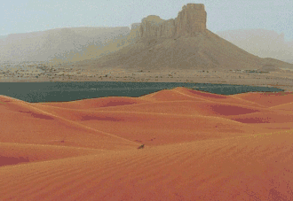 The Nafud desert on the outskirts of Riyadh with the Jabal Tuwaiq in the background