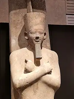 Osiride statue of Senusret I wearing the Deshret