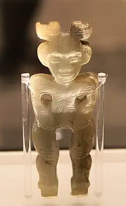 Jade figurine with sartorial details; Fu Hao mausoleum, 2nd millennium BC
