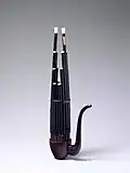 Chinese sheng mouth organ, using oriental free reeds.
