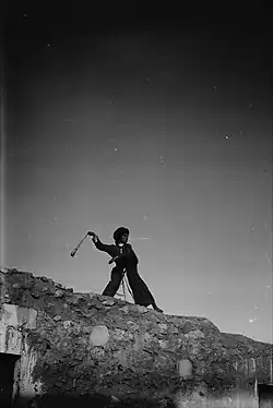 Arab shepherd boy using a sling, c. 1900–1920, Jerusalem