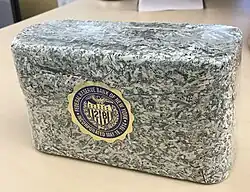 Shredded and briquetted US dollar notes from the Federal Reserve Bank of New York (approx.&nbsp;1000 pieces, 1&nbsp;kg)
