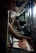 Weaving a silk brocade