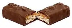 Snickers candy bar, cut in half