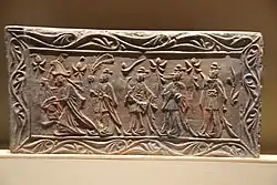 Men wearing kuzhe with xi depicted on a Southern dynasty brick relief, unearthed in Dengxian, Henan, 1958. depicted on a Southern dynasty brick relief, unearthed in Dengxian, Henan, 1958.