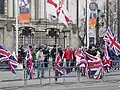 Unionist demonstrators in Belfast displaying the Union Flag, Ulster Banner and Saint Patrick's Saltire
