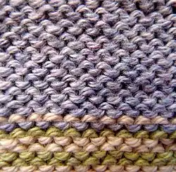 Close-up of back of stockinette stitch, also same appearance as reverse stockinette stitch
