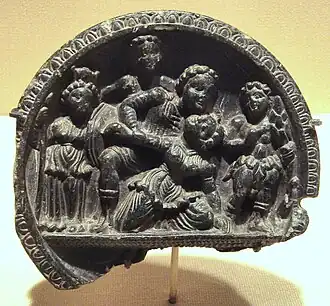 Mythological scene with Athena (left) and Heracles (right), on a stone palette of the Greco-Buddhist art of Gandhara, India