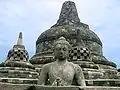 Buddha in the exposed stupa of Borobudur mandala, Central Java, Indonesia, c. 825.