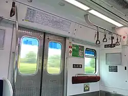 Space for wheelchair stroller carrier (inside the train)