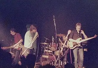 The Fall, Perverted by Language Tour in Hamburg, Germany (Markthalle), April 1984; L–R: Craig Scanlon, Mark E. Smith, Karl Burns, and Steve Hanley