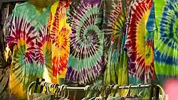 Tie-dye shirts of all colors were at their height and worn by many during the 1960s.