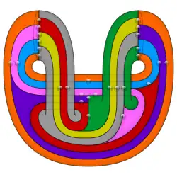 An 8-colored double torus (genus-two surface) – bubbles denote unique contact of two regions