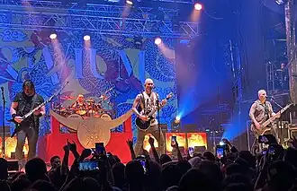 Trivium performing in Barcelona in 2023. From left to right: Corey Beaulieu, Alex Bent, Matt Heafy and Paolo Gregoletto