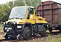 Unimog 405/UGN road-rail vehicle used as a rail car mover