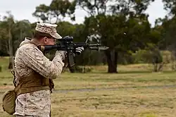 M9 bayonet-fitted M4 carbine firing during secondary target drills.