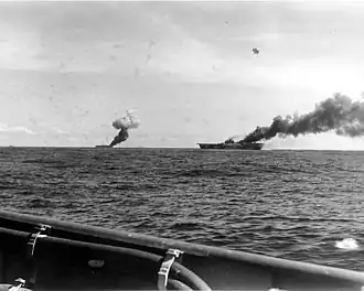 Belleau Wood (left) and Franklin hit by kamikazes, 30 October 1944