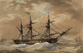 A painting depicting a ship at anchor during rough seas. One side of the ship is prominent in the foreground with the bow and anchor chain to the right of the frame. There are no sails set and only the masts and rigging are shown. Two other ships are shown to the right and left in the far background.