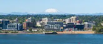 Skyline of Vancouver with Mount St. Helens in the background