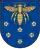 A coat of arms depicting a golden scarab with wings and legs outstretched flying over six purple flowers all on a blue background