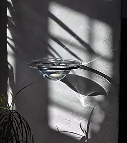 A glass bowl with Holy Water in the Catholic Church in Ystad.