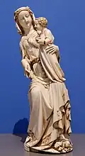 Room 40 – Ivory statue of Virgin and Child, who is crushing a dragon under her left foot from Paris, France, 1310–1330 AD