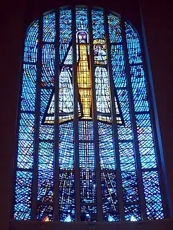 The principal window of the Temple of Maipú, Chile, depicting the Virgin Mary and Christ Child, by Adolfo Winternitz, showing the traditional use of blue as the predominant colour, emphasising an association with Heaven.