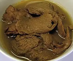 Photo of vegetarian "mock duck" made of wheat gluten in a brine with seasonings.