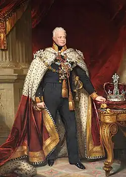 An oil portrait of William IV in his coronation robes. On the table to his left is the Crown of St Edward.
