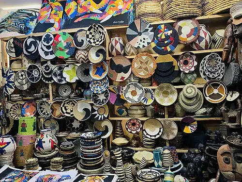 Photograph depicting baskets hung up for sale