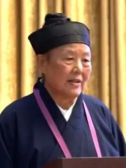 Wu Chengzhen, the first female fangzhang, or Taoist principal abbess, wearing cross-collared jiaoling youren clothing, 2023.