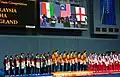 England Commonwealth Games badminton team on the winner's podium at the 2010 games.