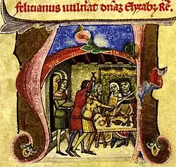 An elderly bearded man holding a sword is stabbed in the neck by a young man