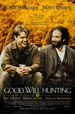 Main characters Will Hunting and Sean Maguire smiling while sitting on a bench, with yellowed leaves in the background.