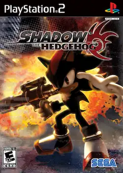 The game's cover art. A black and red hedgehog with spiky hair holds a handgun and other weapons, striking an attacking pose with an unhappy expression on his face. A stylized explosion is visible in the background. The words "Shadow the Hedgehog" adorn the top of the screen, as does a red logo that resembles the hedgehog's head.