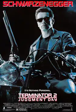 A human-like figure wearing sunglasses holds a shotgun while on a motorcycle. The tagline reads "It's nothing personal." followed by the film's title and credits and rating at the bottom.